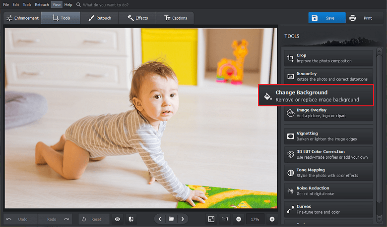 Open your picture with PhotoWorks and pick the Change Background tool